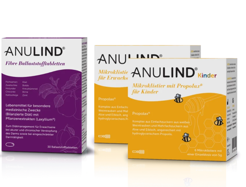 Anulind Produkte für Erwachsene und Kinder im Vordergrund, gelb und violett.